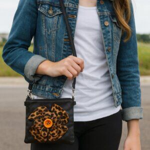 Small purse with leopard print floral decor